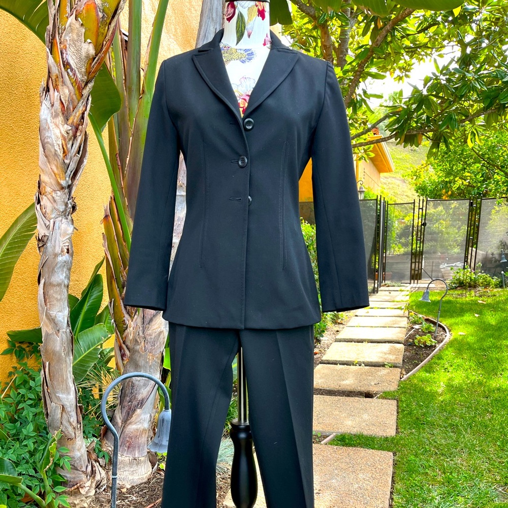 Classic black suit from Nordstrom. Extremely comfortable.  Almost new condition.